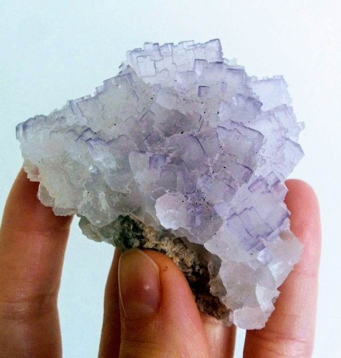 Crystal in palm of hand